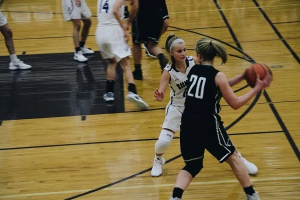 basketball player driving to basket